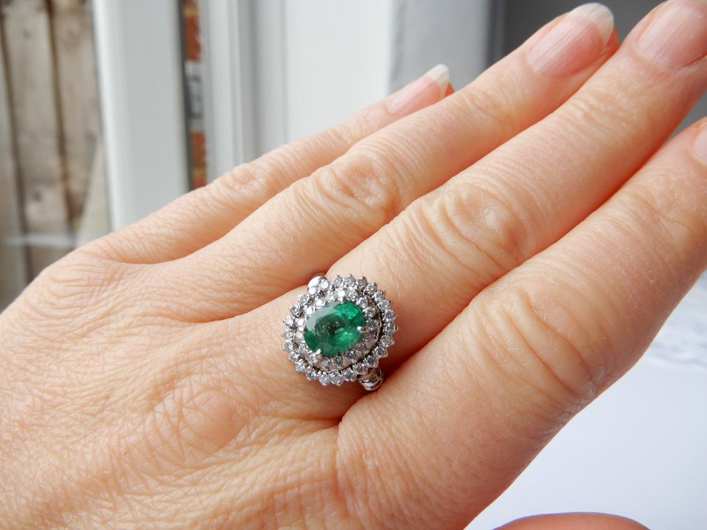 14ct White Gold Emerald & Diamond Halo Ring