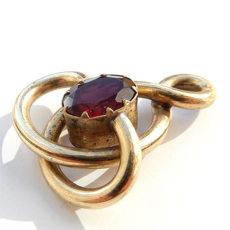 Antique Pinchbeck Garnet Paste Knot Pendant