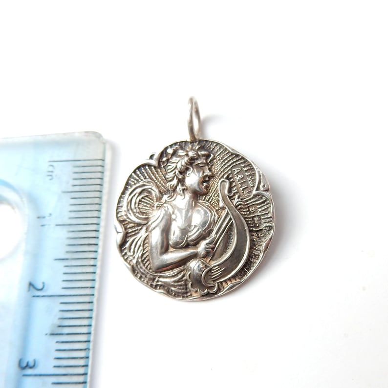 Art Nouveau Sterling Silver Repousee Coin Pendant