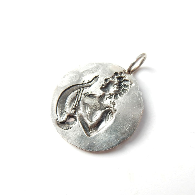 Art Nouveau Sterling Silver Repousee Coin Pendant