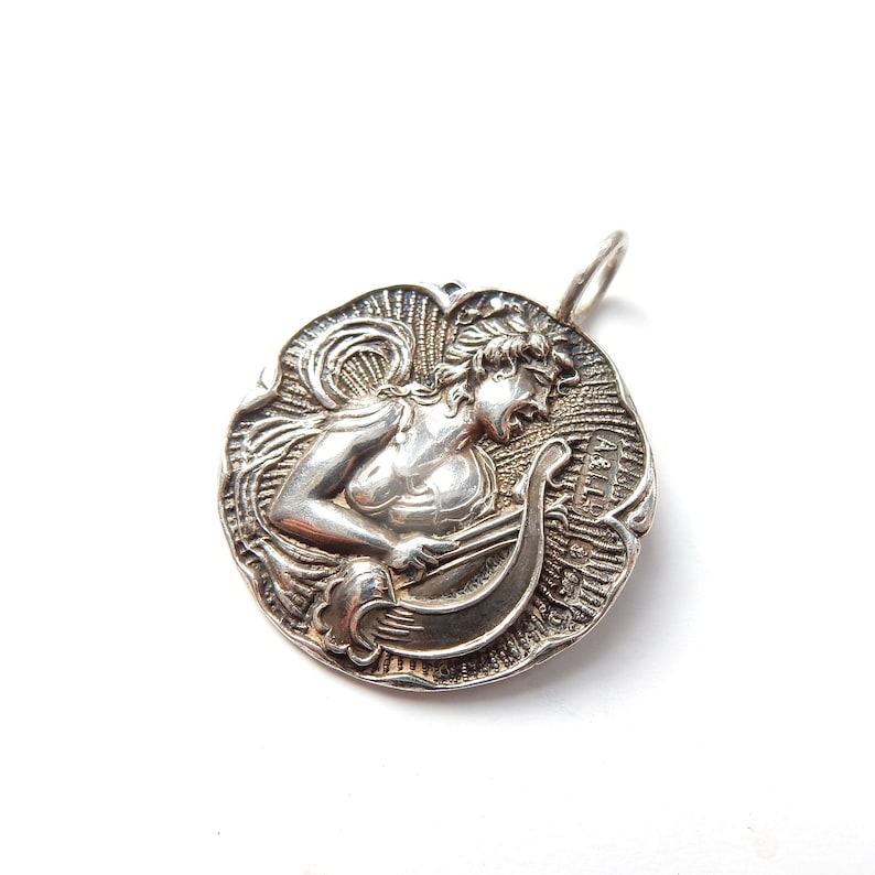 Art Nouveau Sterling Silver Repousee Coin Pendant