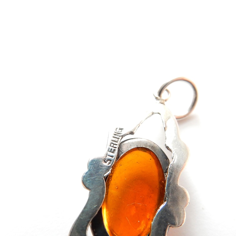 Antique Sterling Silver Dragons Breath Pendant