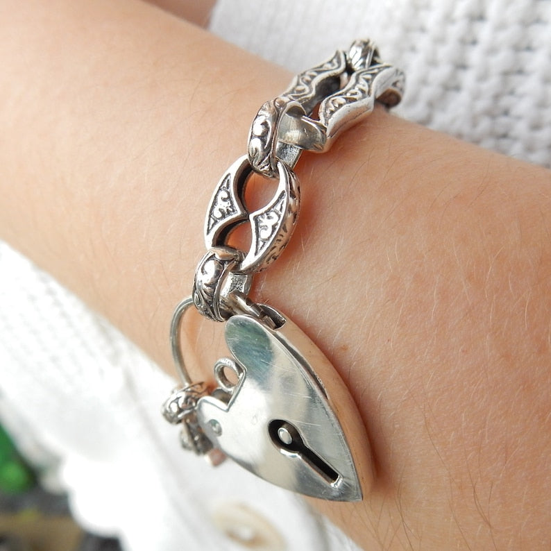Vintage Sterling Silver Embossed Bracelet with Heart Padlock Catch