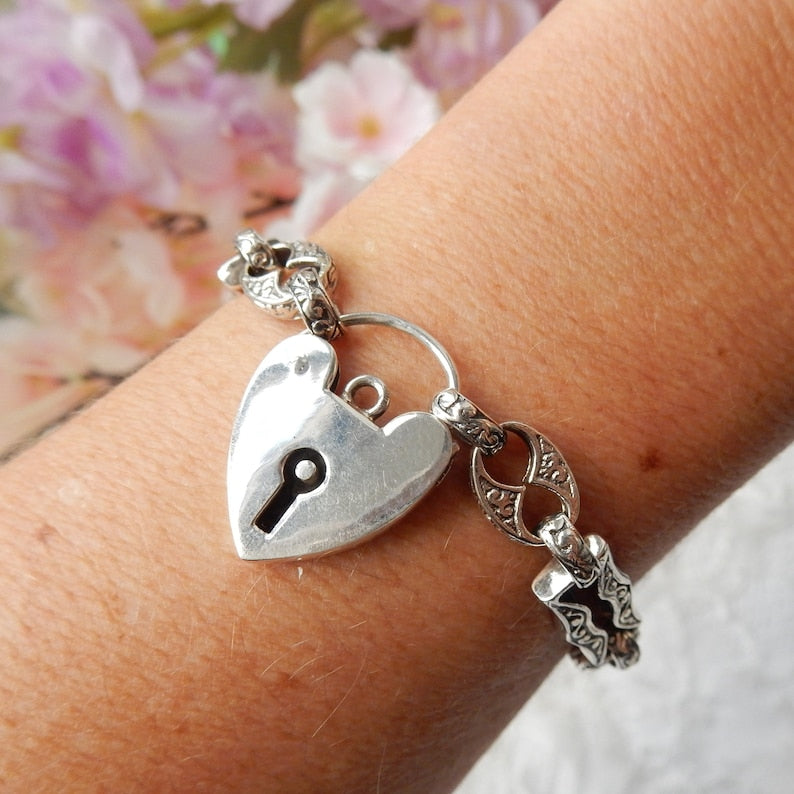 Vintage Sterling Silver Embossed Bracelet with Heart Padlock Catch