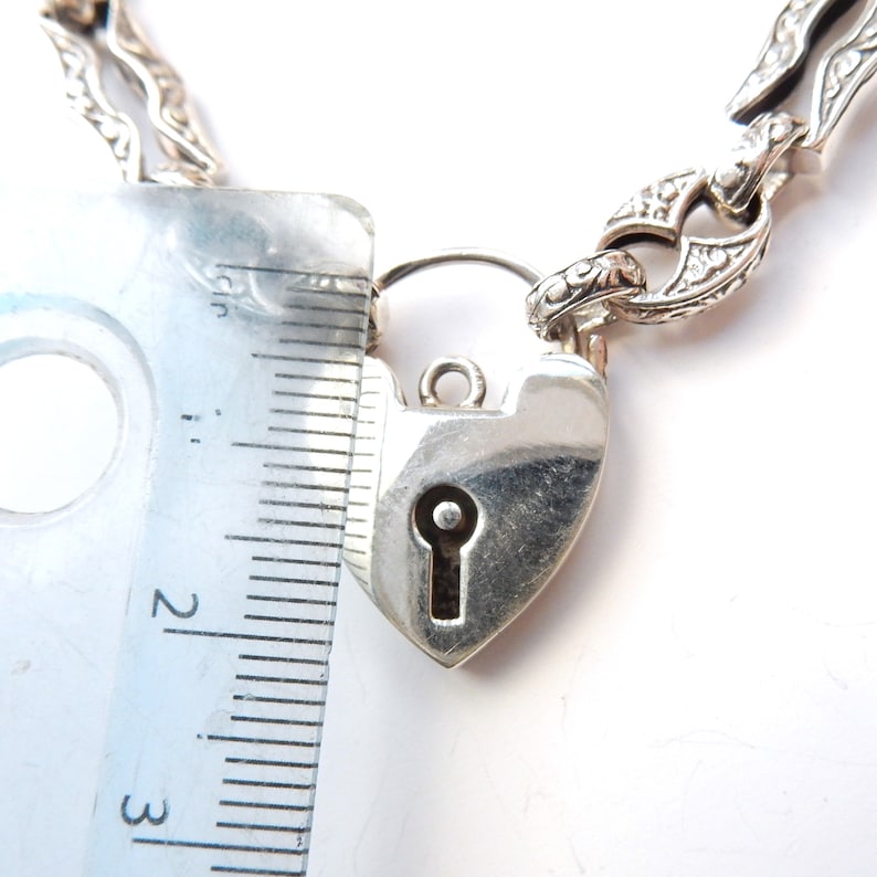 Vintage Sterling Silver Embossed Bracelet with Heart Padlock Catch