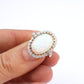 Impressive 9ct Gold Opal & Diamond Halo Ring