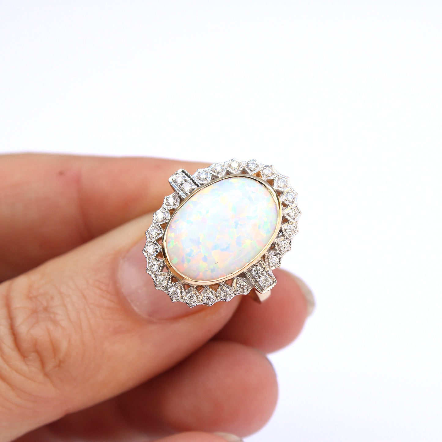 Impressive 9ct Gold Opal & Diamond Halo Ring