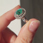 14ct White Gold Emerald & Diamond Halo Ring