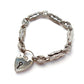 Vintage Sterling Silver Embossed Bracelet with Heart Padlock Catch
