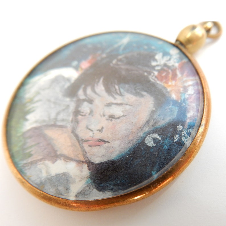Antique Locket depicting Painted Portrait of Sleeping Fairy