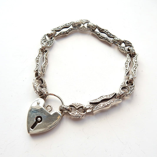 Vintage Sterling Silver Embossed Bracelet with Heart Padlock Catch